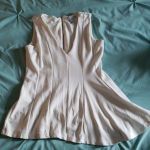 H & M top. Fitted through waist flair at the hip